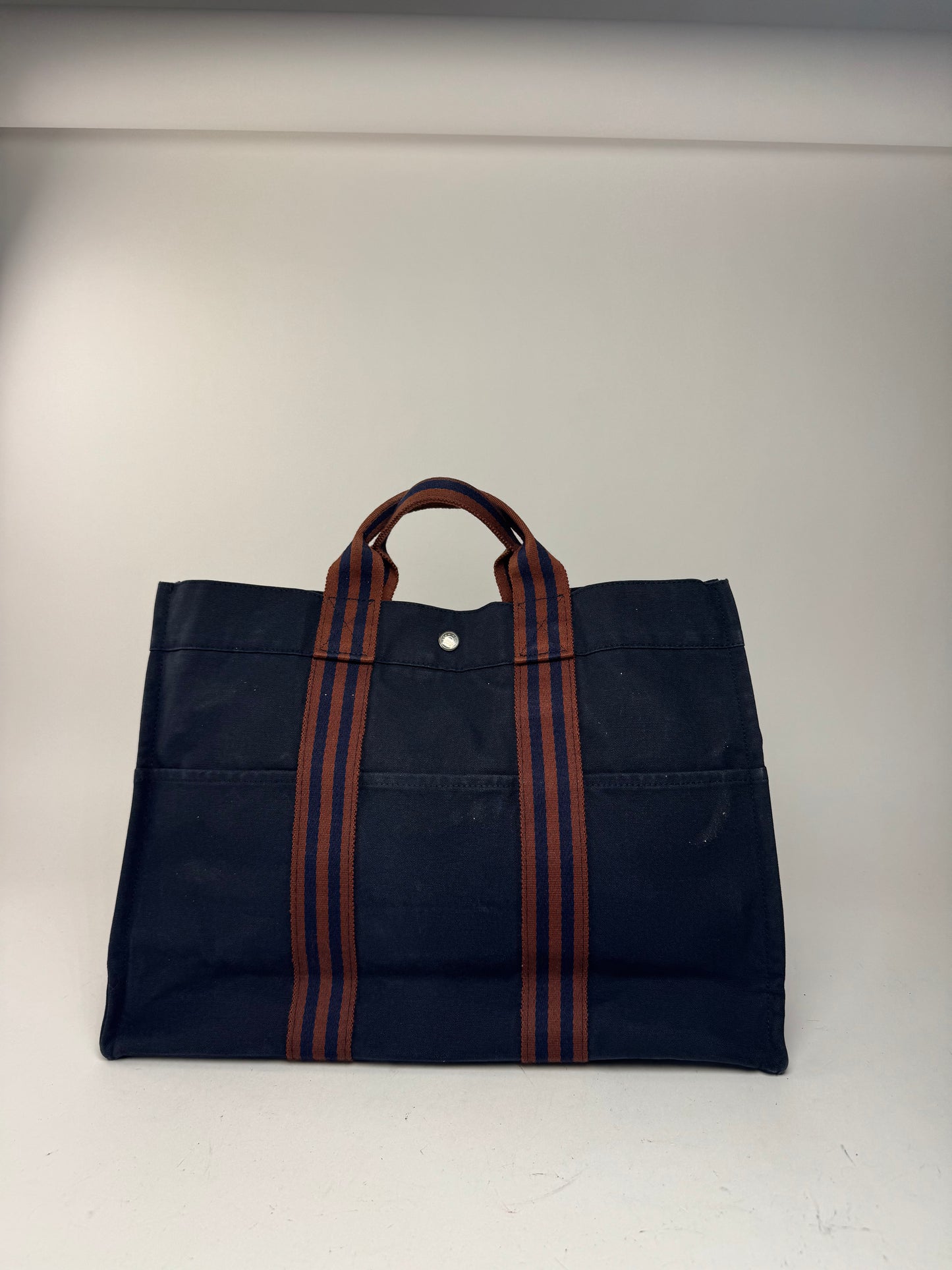 Sac cabas vintage Hermès en toile bleu marine rouge