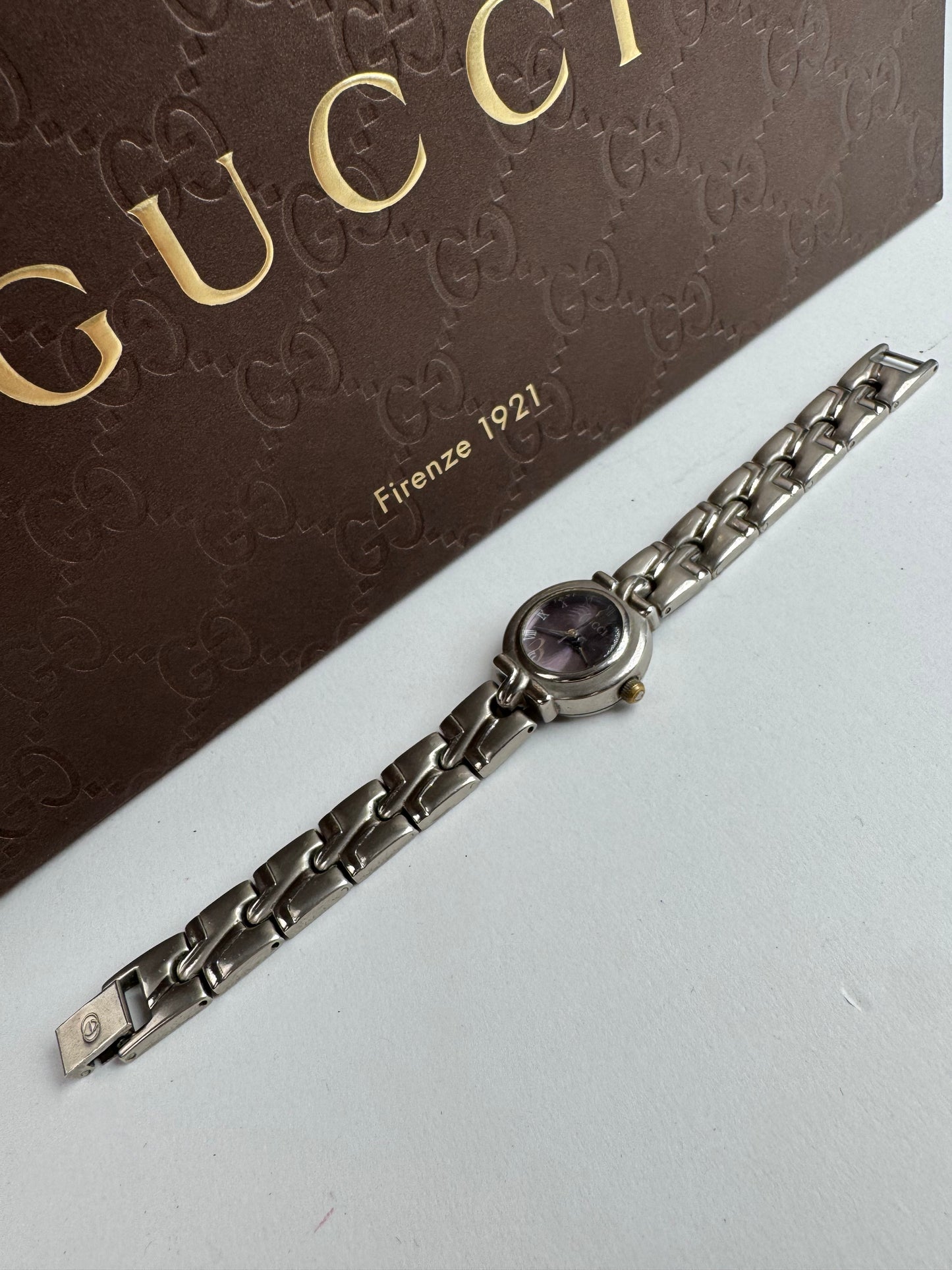 Montre Gucci vintage en acier argenté