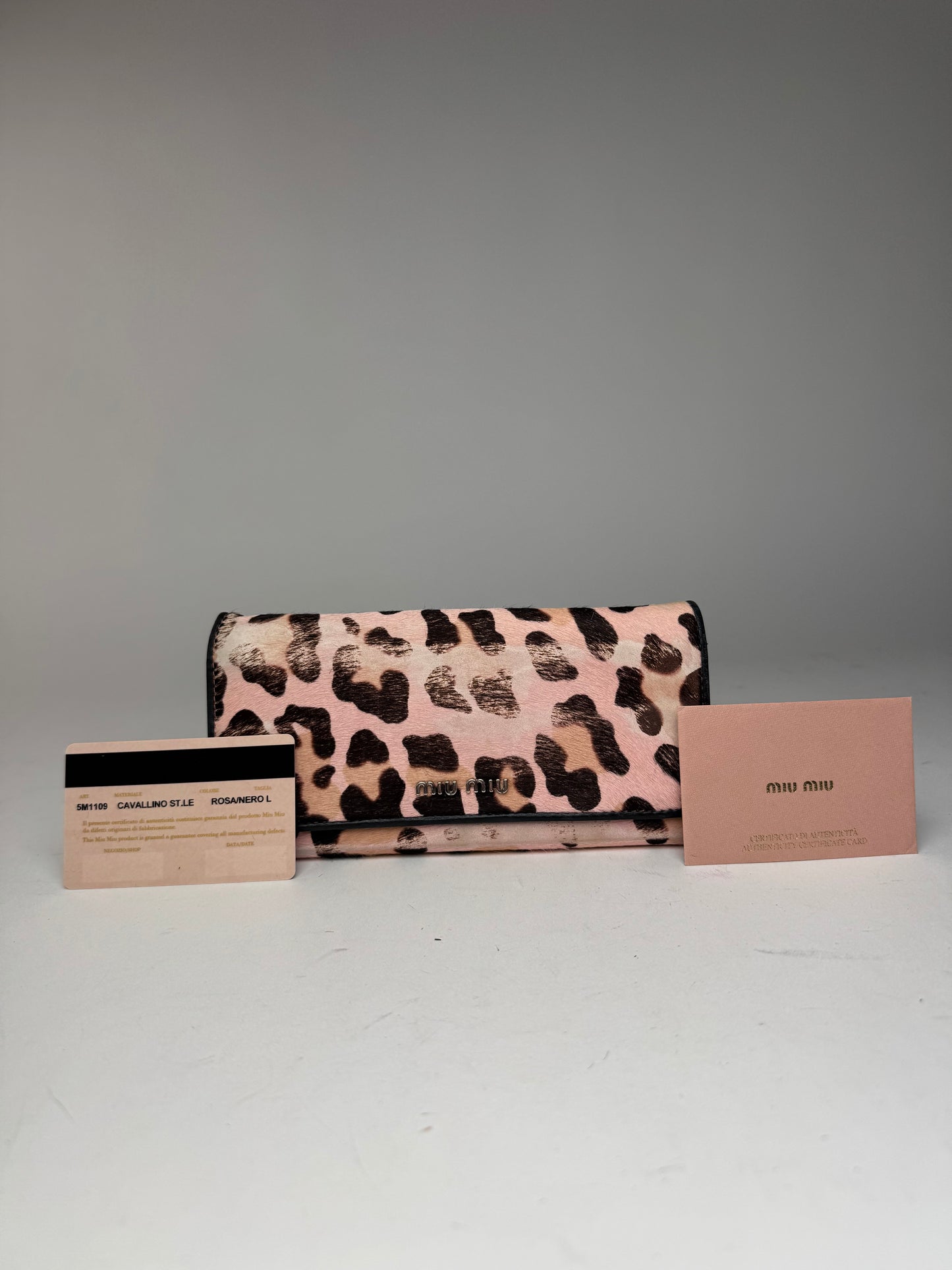 Portefeuille vintage en cuir fourrure Miu Miu noir rose