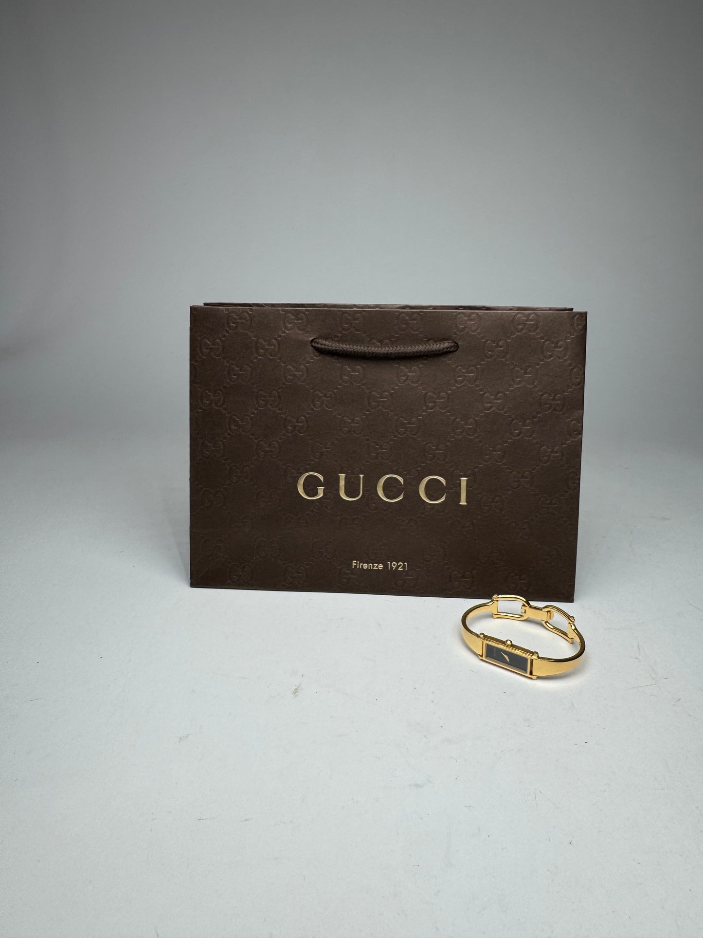 Montre Gucci vintage à mors en or