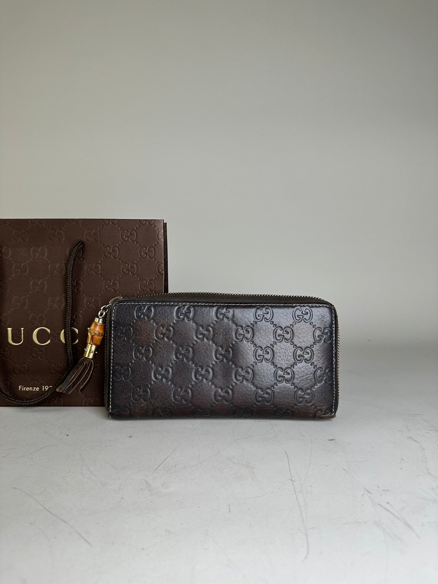 Vintage Gucci GG Embossed Leather Zip Wallet Dark Brown Gold