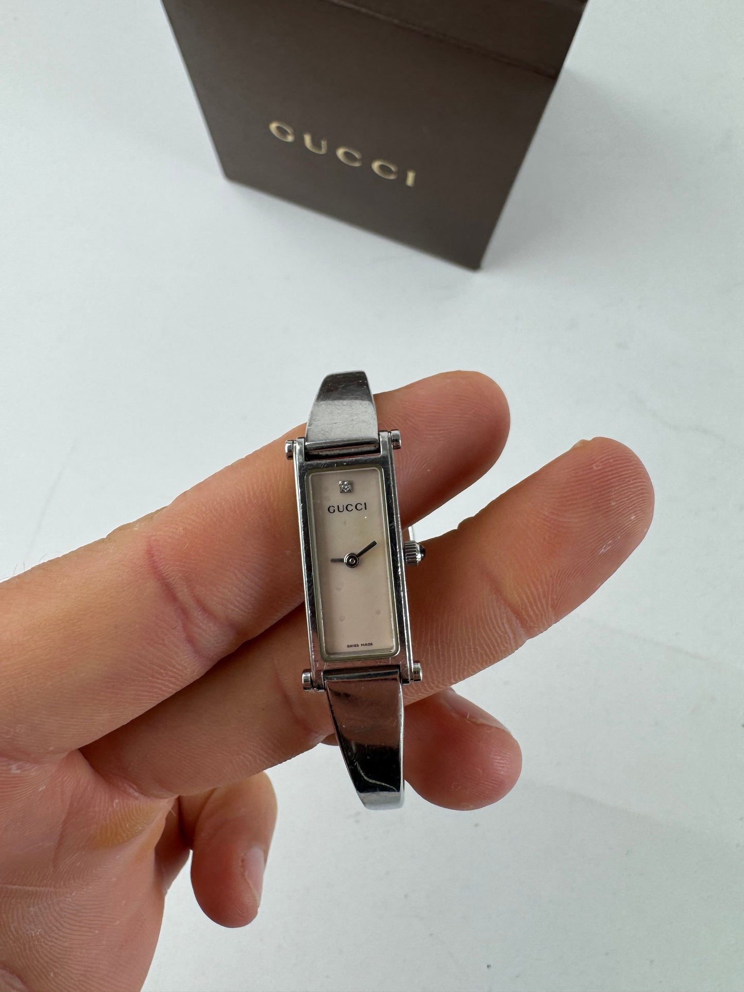 Montre Gucci vintage en acier avec mors argenté