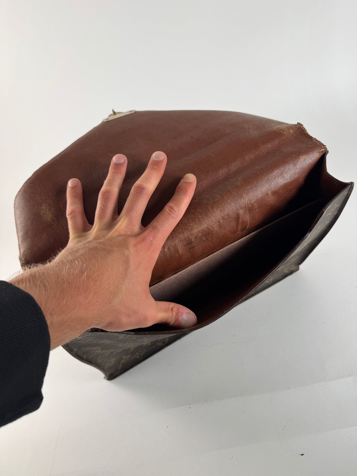 Vintage Louis Vuitton monogram leather clutch