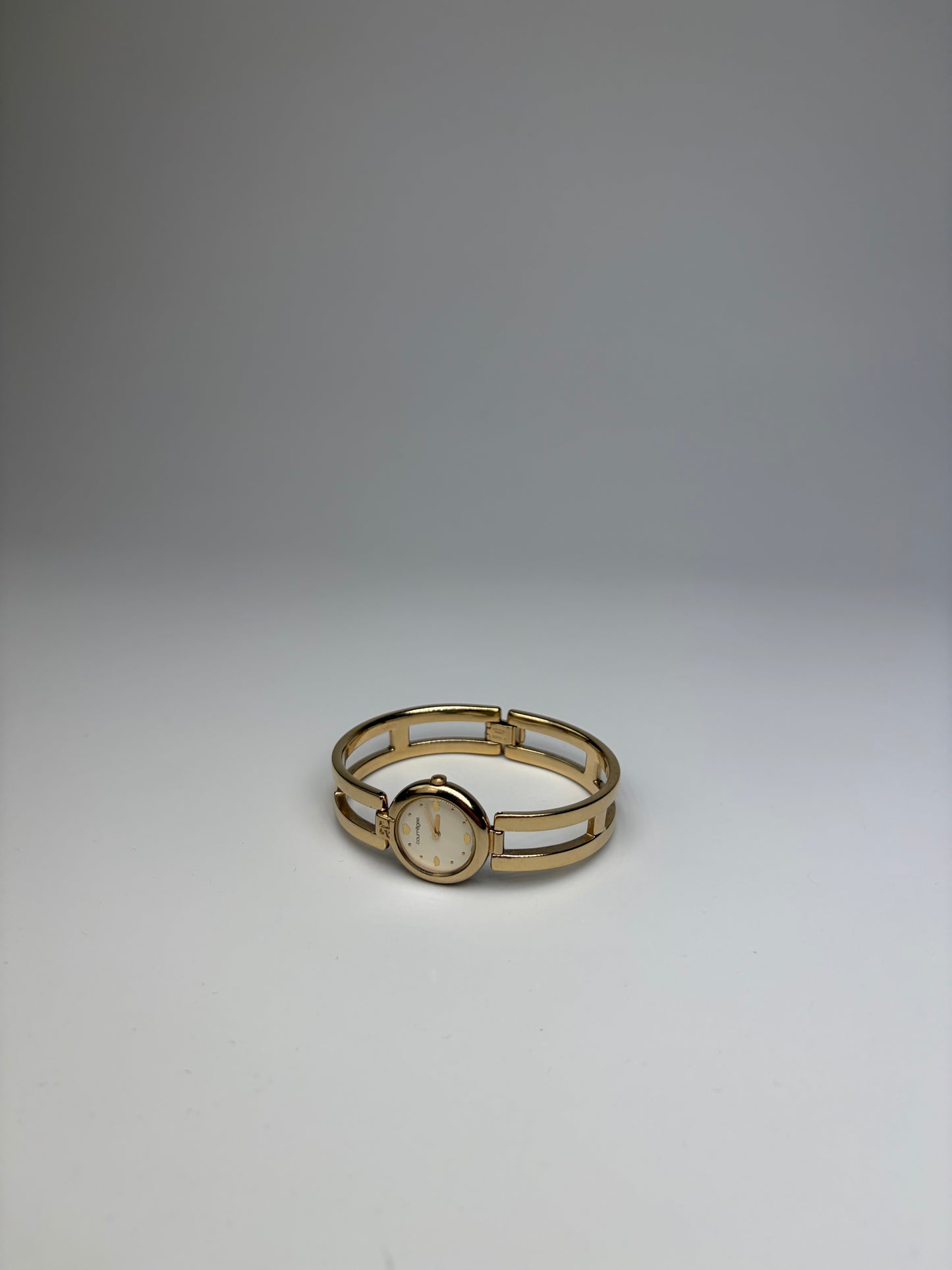 Vintage Courreges Gold-Tone Bangle Watch Cream Yellow Face