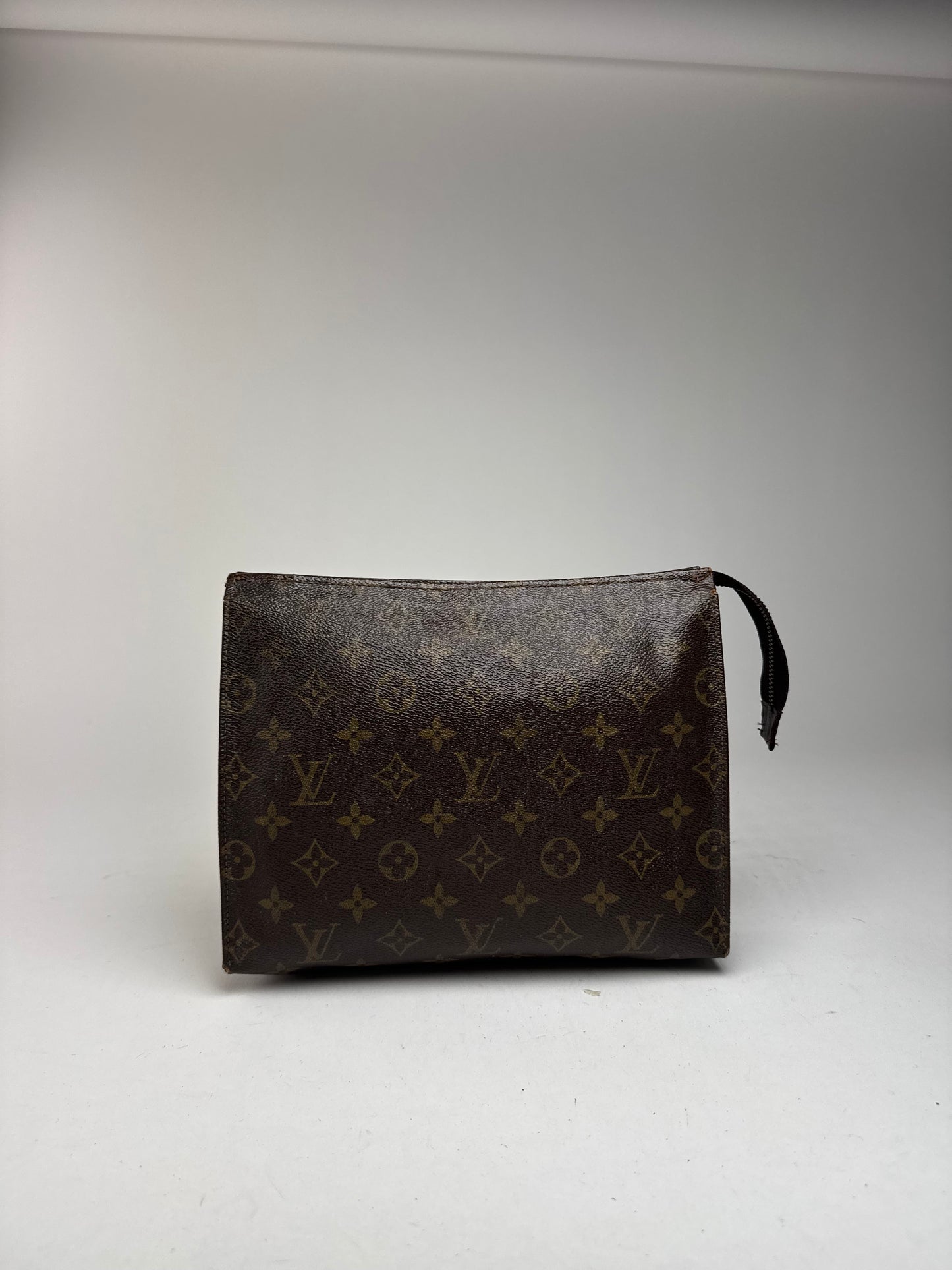 Vintage Louis Vuitton Monogram leather clutch brown