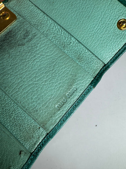 Porte-clés vintage en cuir vert Miu Miu