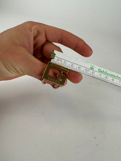 Bague Gucci G vintage en acier doré