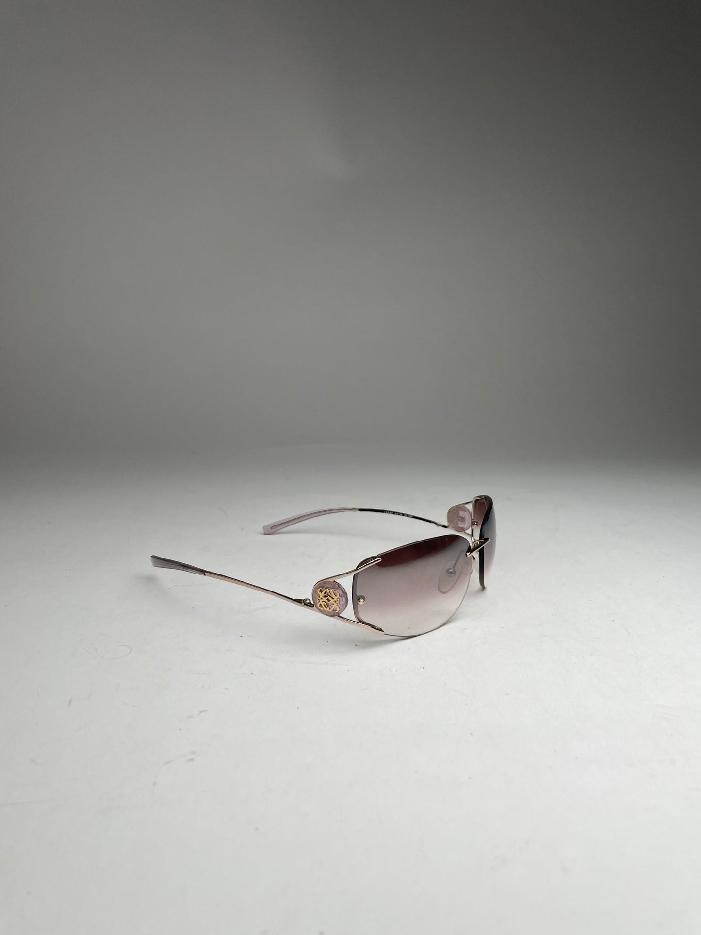 Vintage Loewe Madrid Frameless Sunglasses purple silver