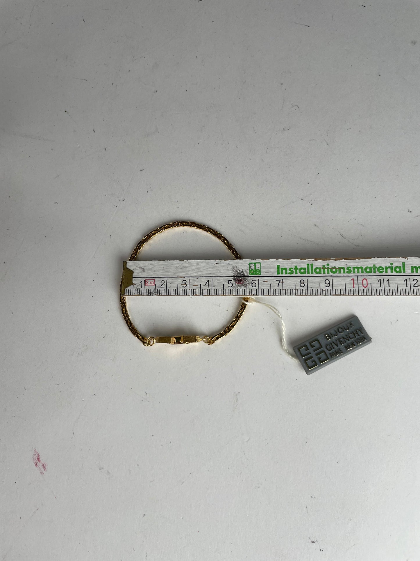 Bracelet vintage Givenchy en acier doré neuf