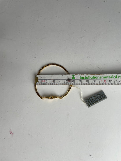 Bracelet vintage Givenchy en acier doré neuf
