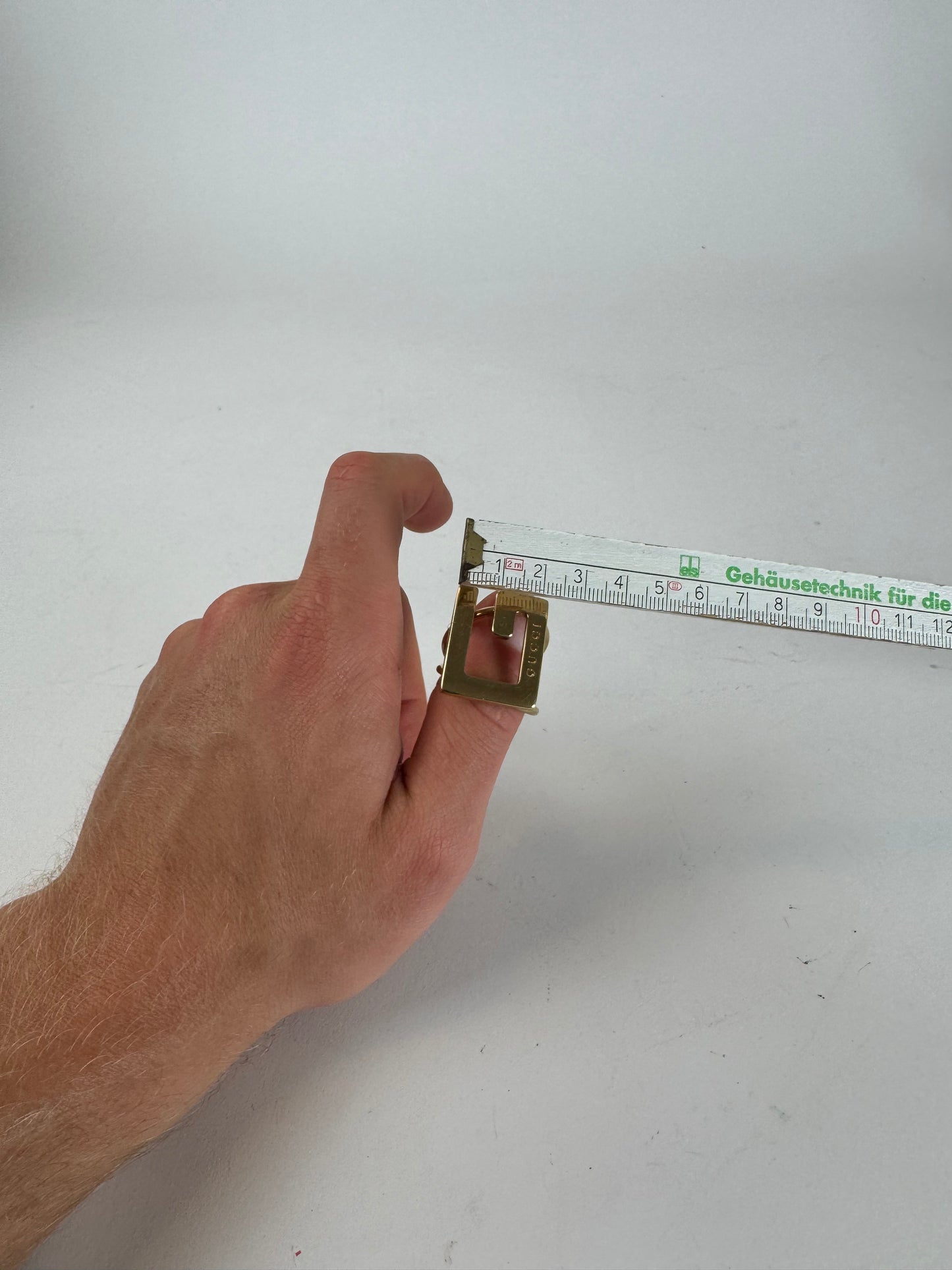 Bague Gucci G vintage en acier doré