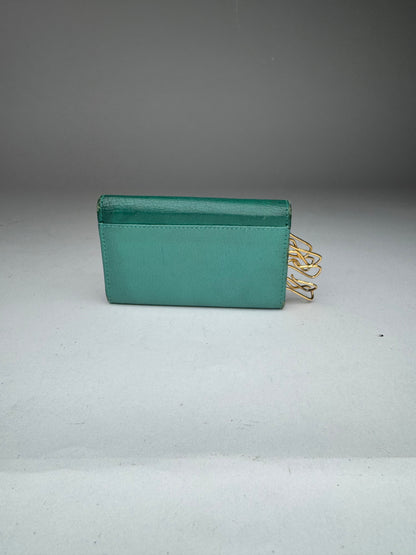 Porte-clés vintage en cuir vert Miu Miu