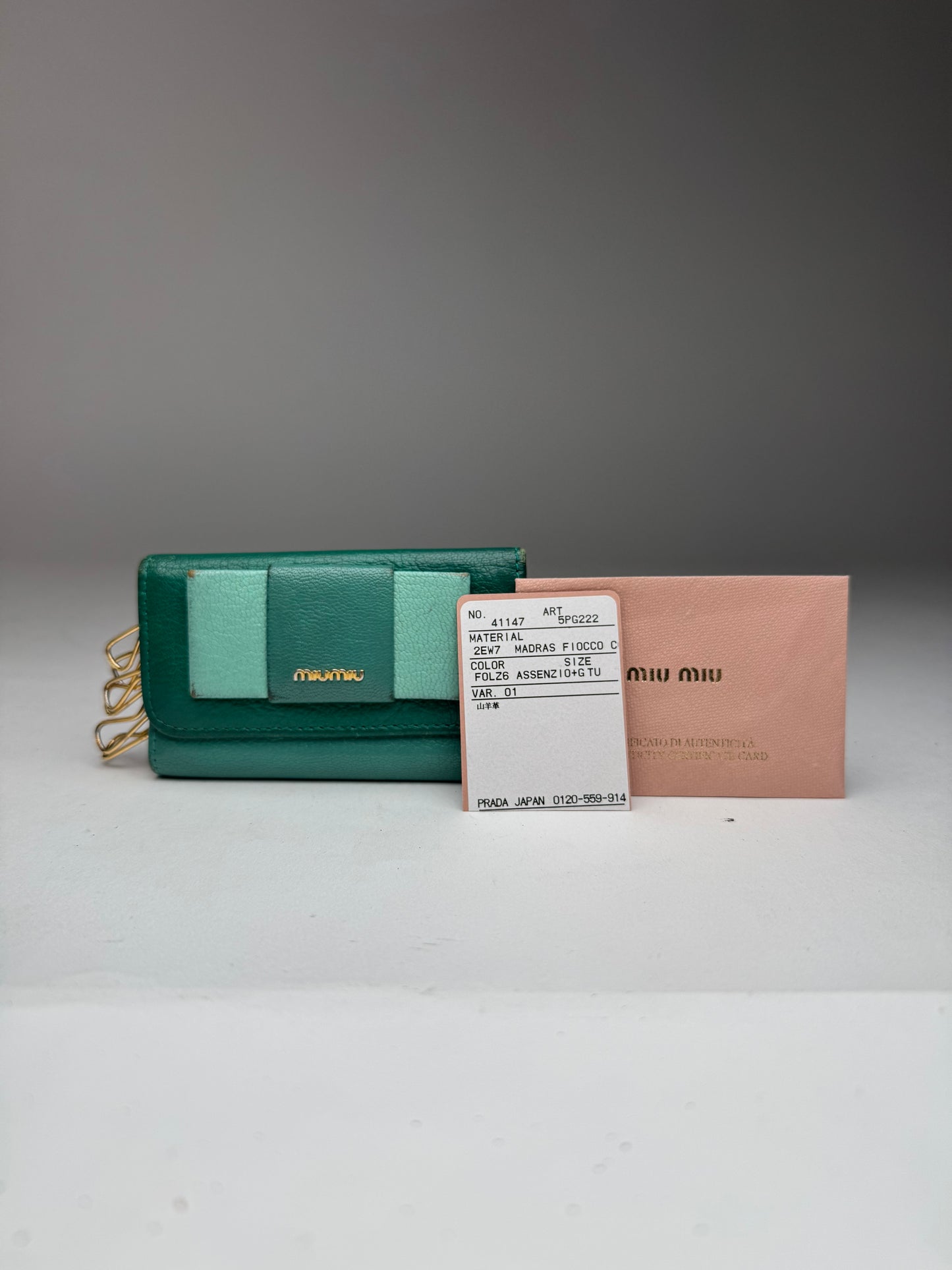 Porte-clés vintage en cuir vert Miu Miu