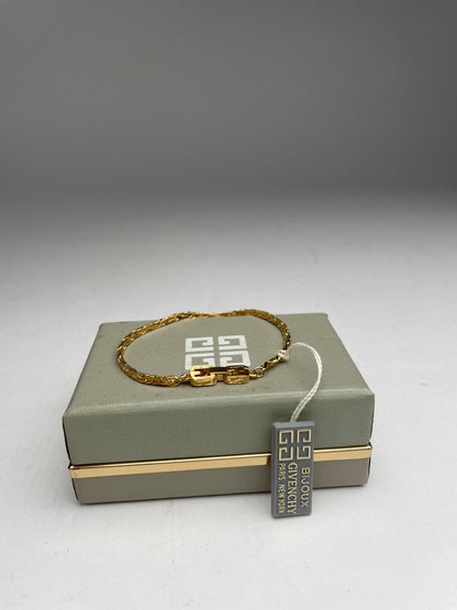 Bracelet vintage Givenchy en acier doré neuf