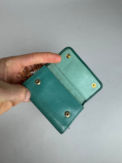 Porte-clés vintage en cuir vert Miu Miu