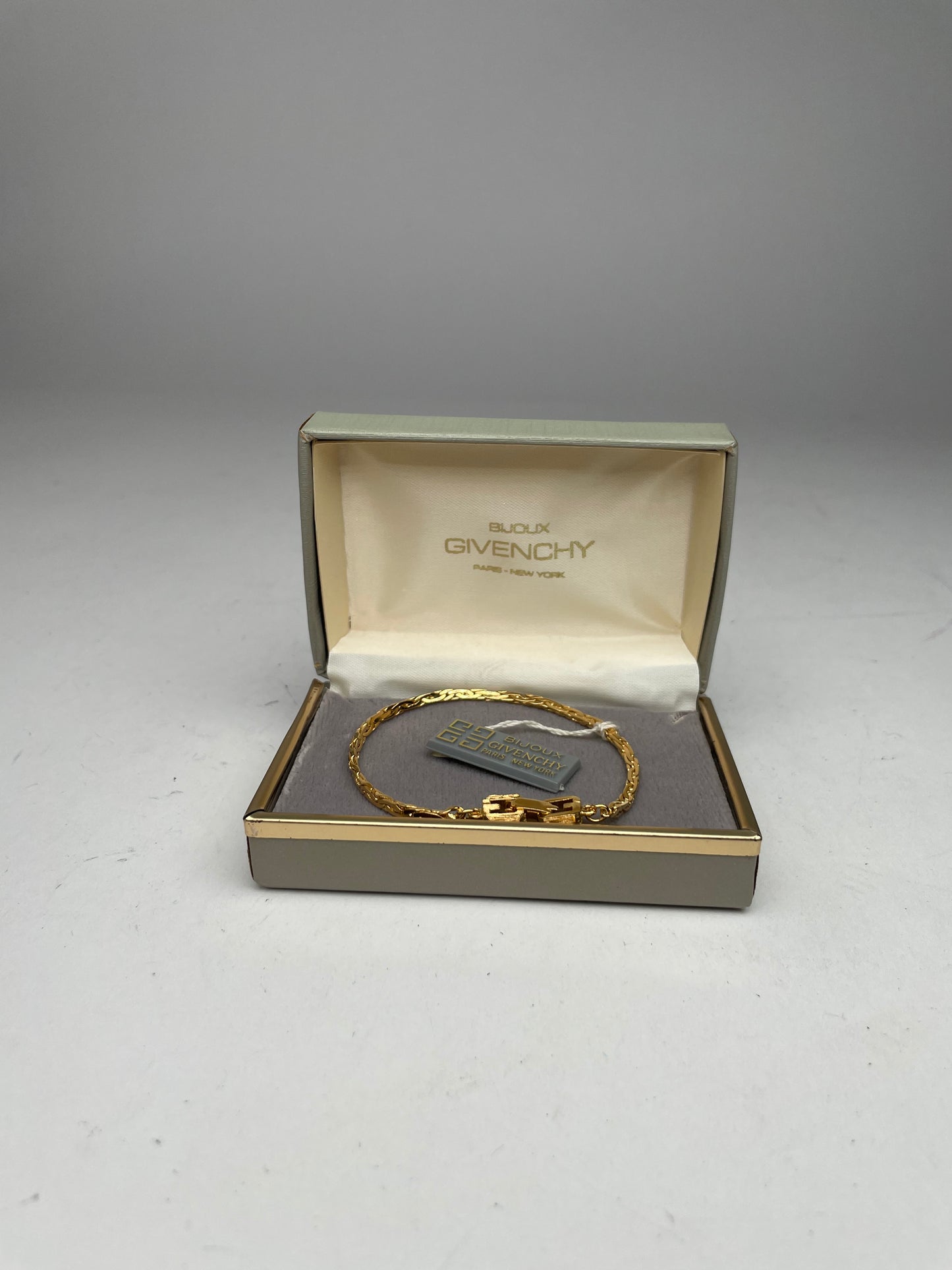 Bracelet vintage Givenchy en acier doré neuf