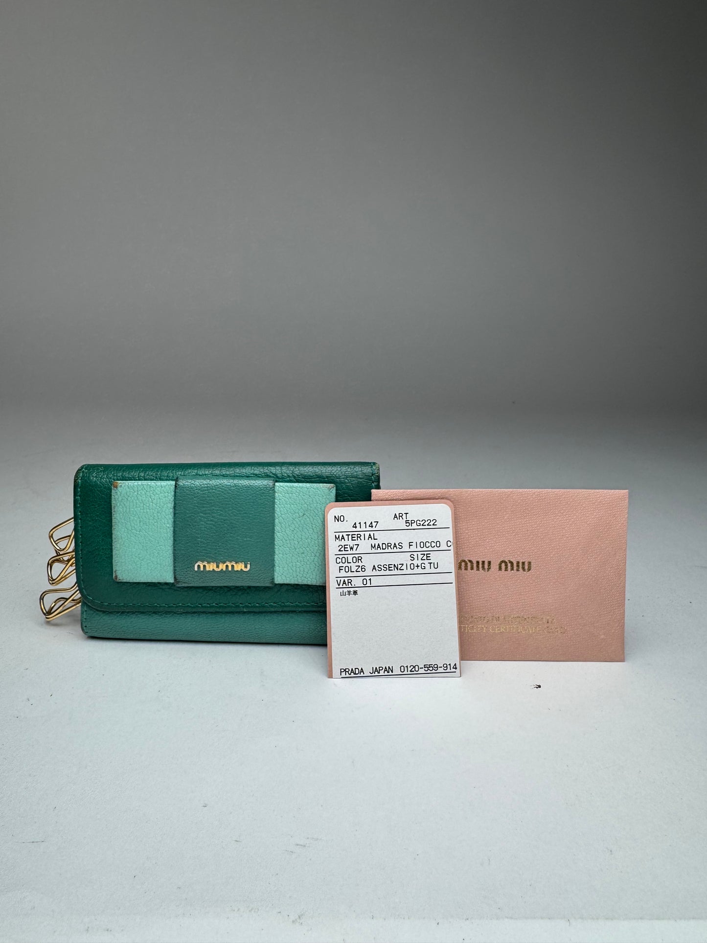 Porte-clés vintage en cuir vert Miu Miu