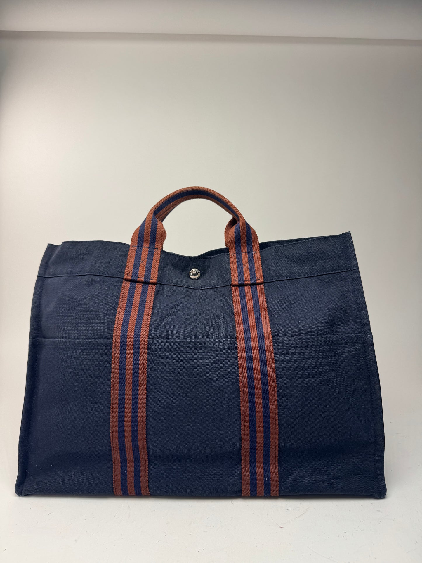 Sac cabas vintage Hermès en toile bleu marine rouge