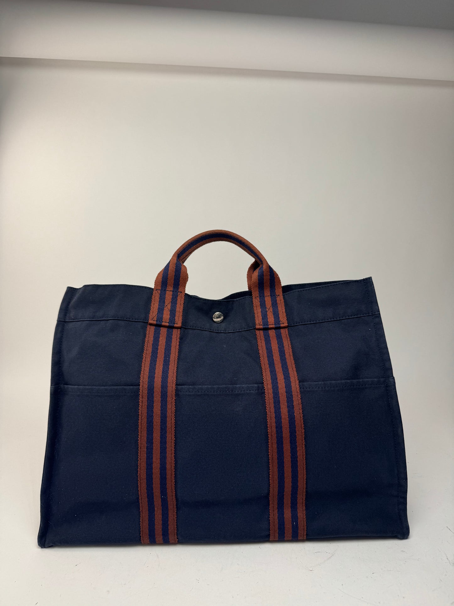 Sac cabas vintage Hermès en toile bleu marine rouge