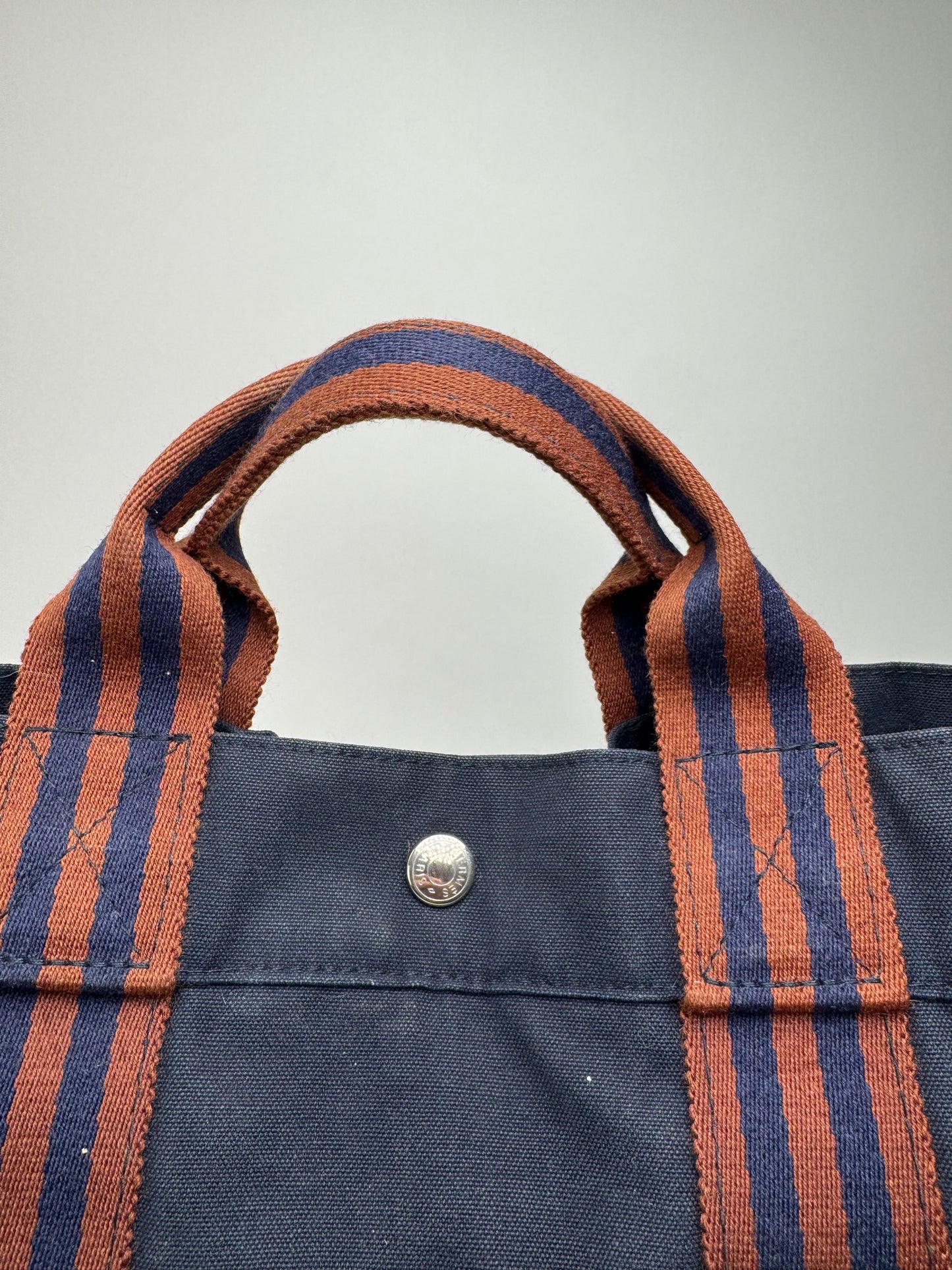 Sac cabas vintage Hermès en toile bleu marine rouge