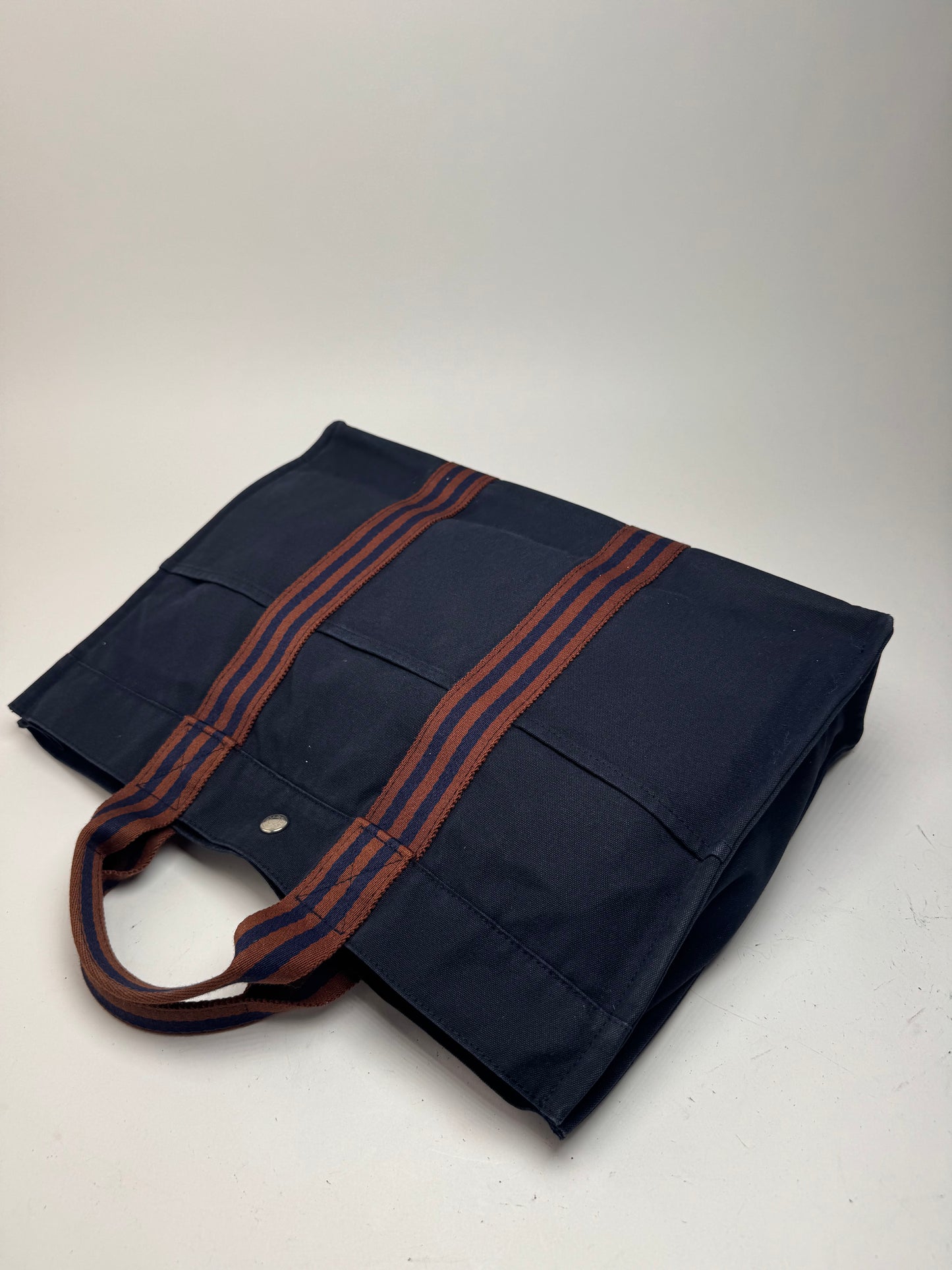 Sac cabas vintage Hermès en toile bleu marine rouge
