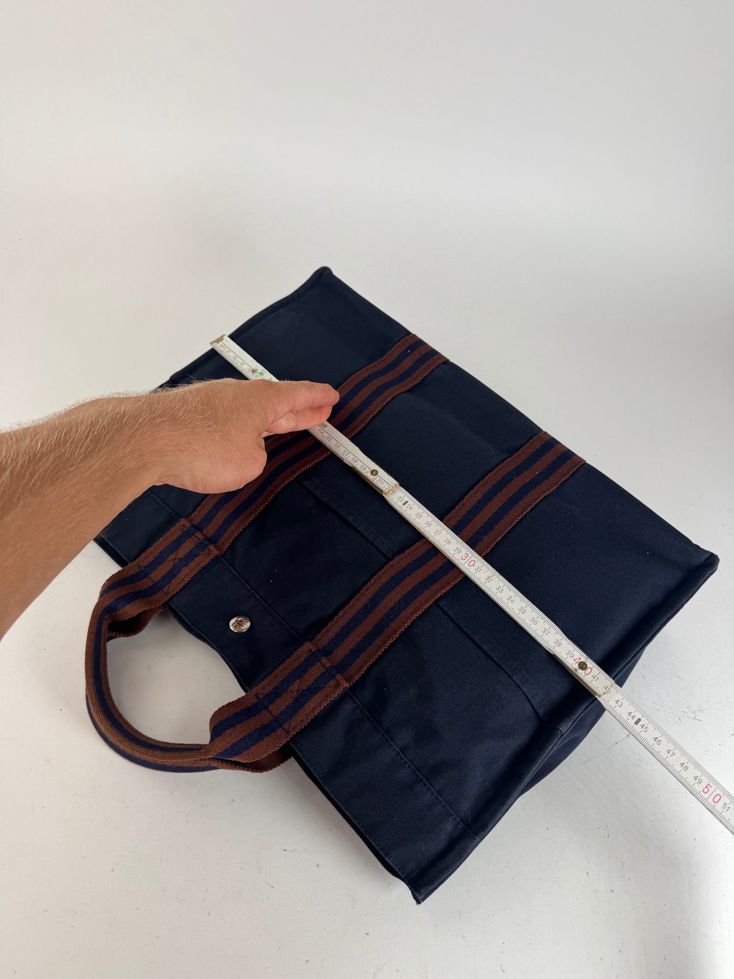Sac cabas vintage Hermès en toile bleu marine rouge