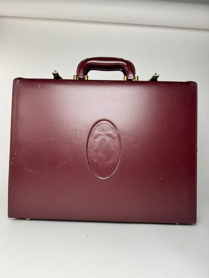 Valise vintage Cartier en cuir bordeaux