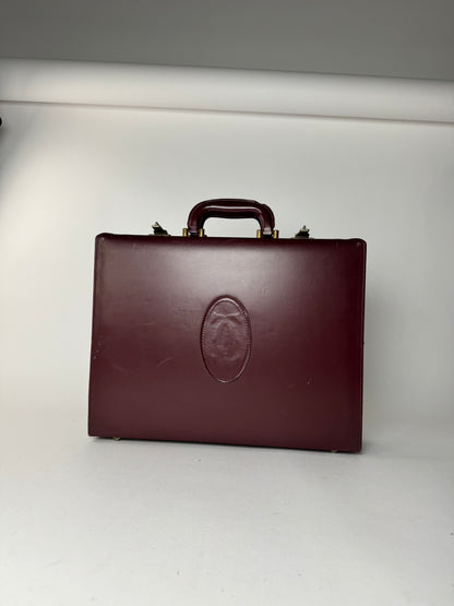 Valise vintage Cartier en cuir bordeaux