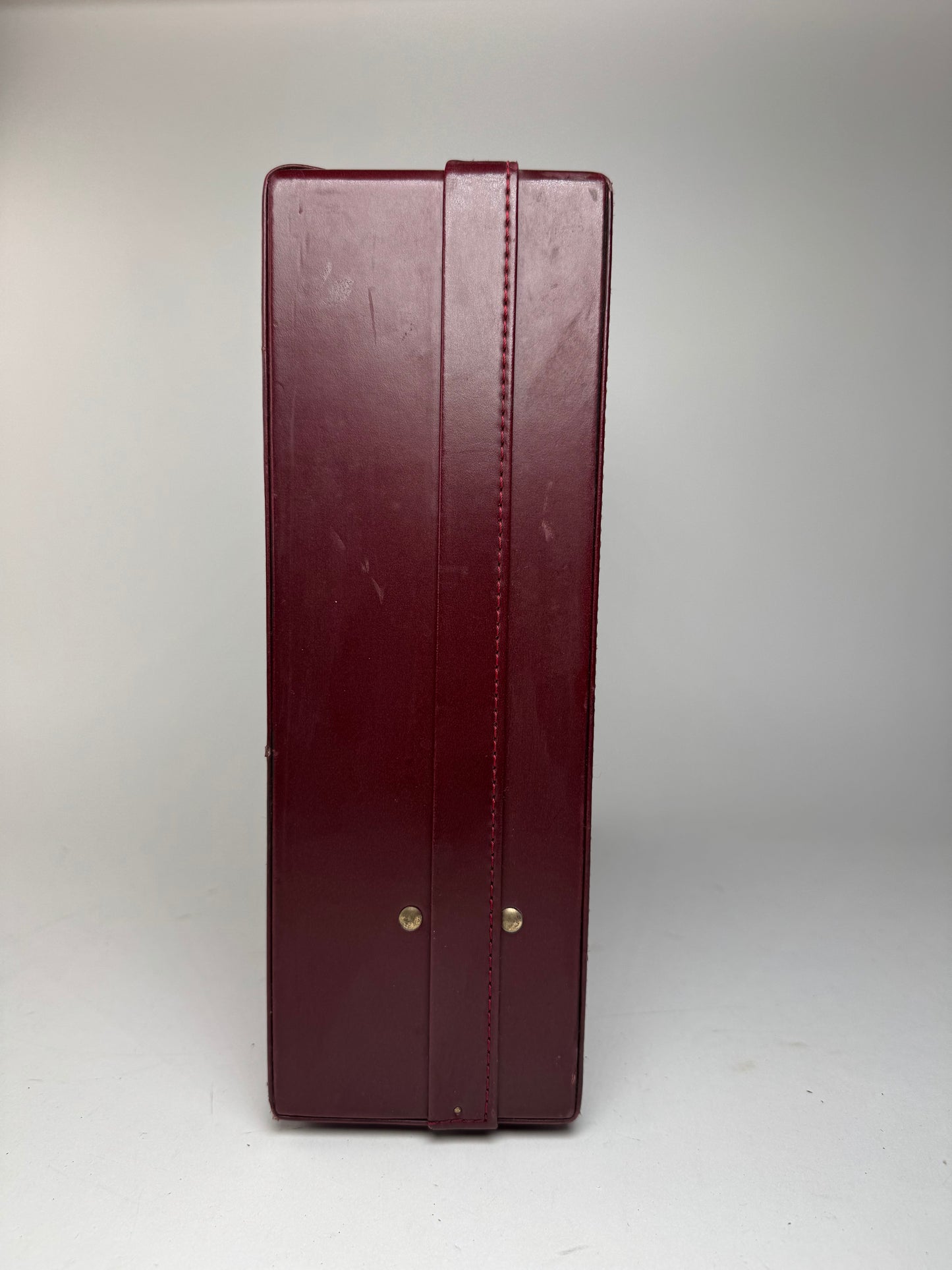 Valise vintage Cartier en cuir bordeaux