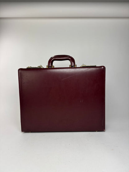 Valise vintage Cartier en cuir bordeaux