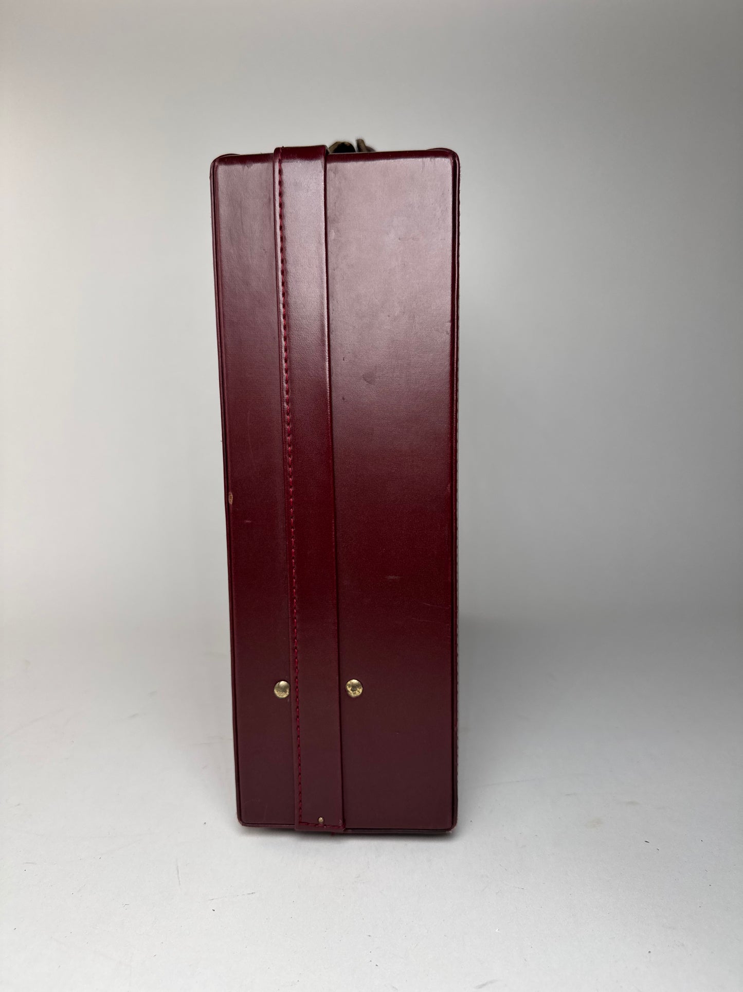 Valise vintage Cartier en cuir bordeaux