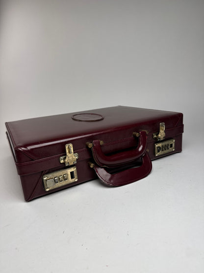 Valise vintage Cartier en cuir bordeaux