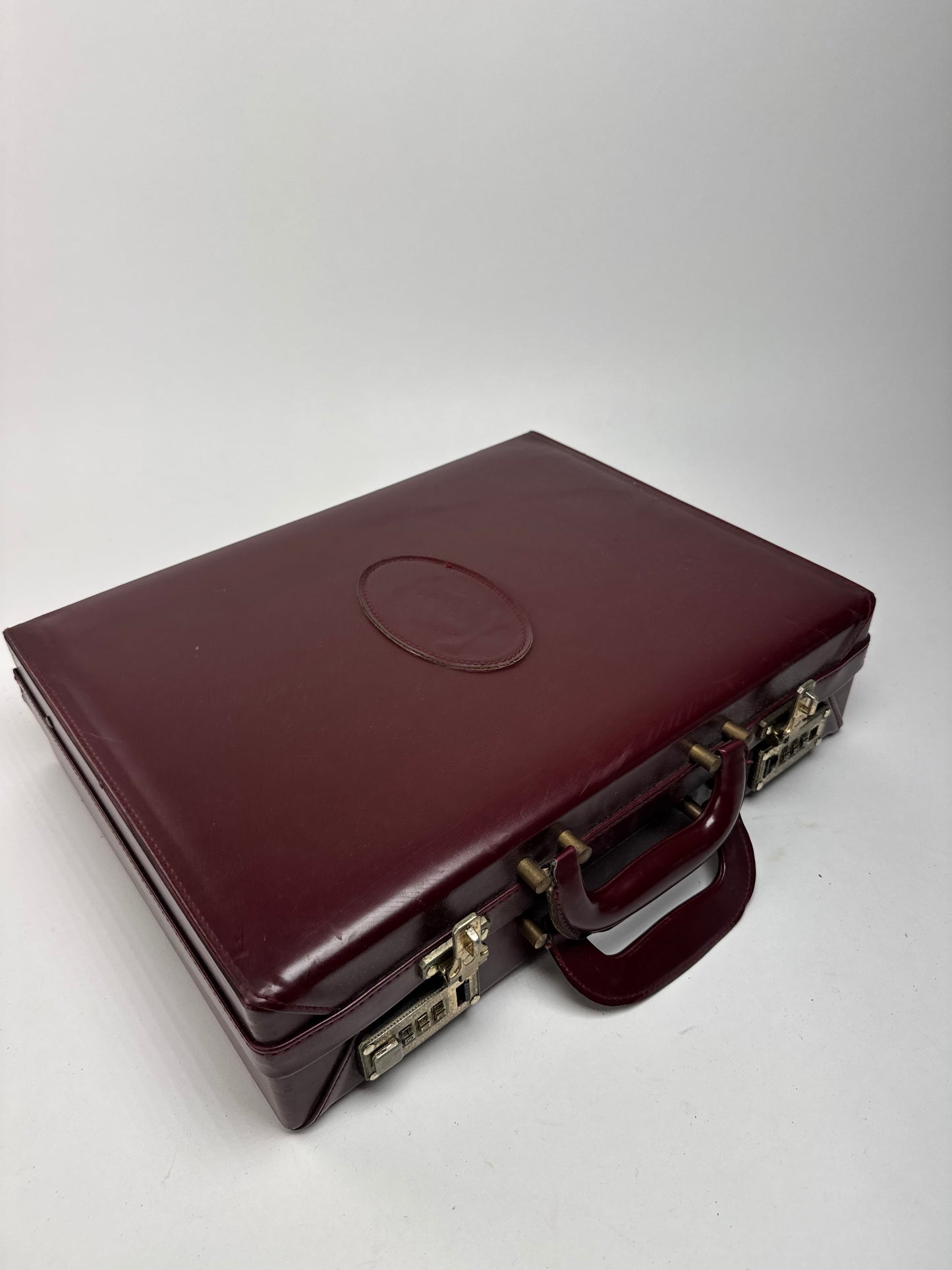 Valise vintage Cartier en cuir bordeaux