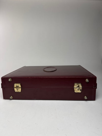 Valise vintage Cartier en cuir bordeaux