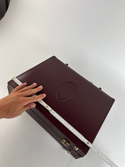 Valise vintage Cartier en cuir bordeaux