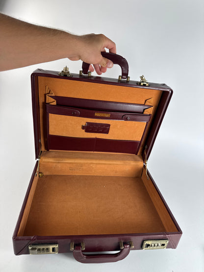 Valise vintage Cartier en cuir bordeaux