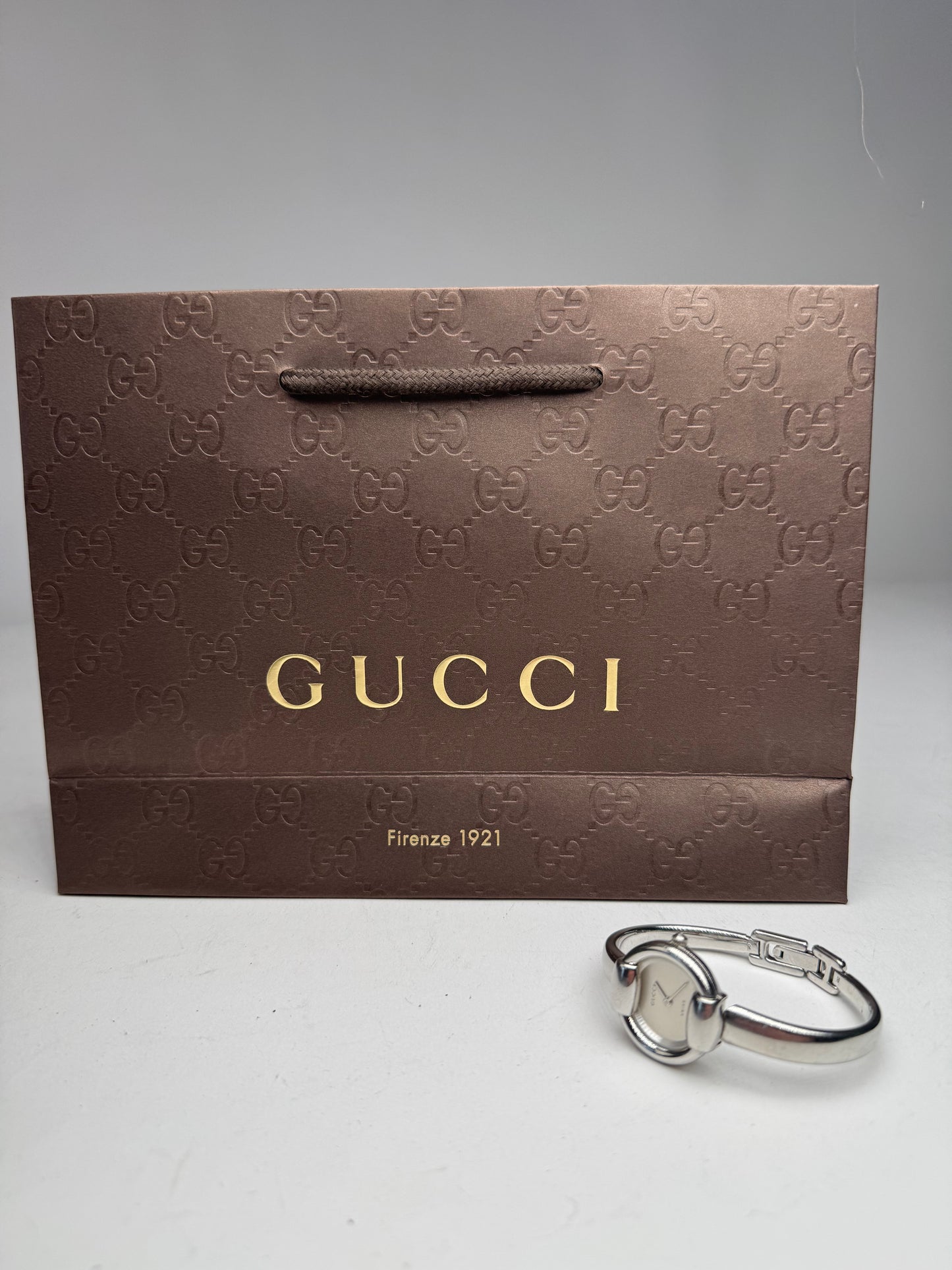 Montre Gucci vintage en acier avec mors de cheval argenté