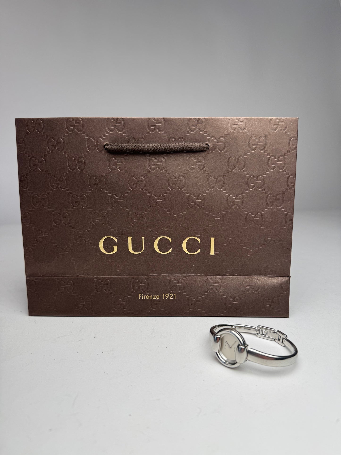 Montre Gucci vintage en acier avec mors de cheval argenté