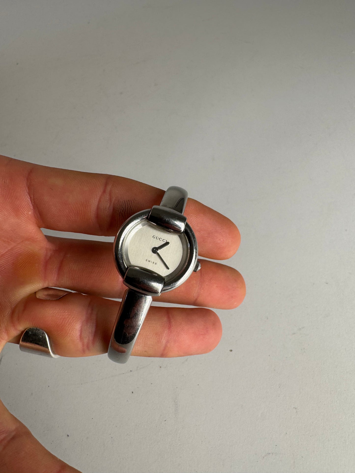 Montre Gucci vintage en acier avec mors de cheval argenté