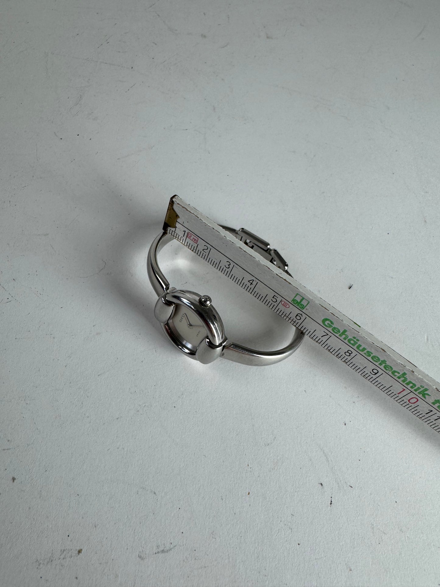 Montre Gucci vintage en acier avec mors de cheval argenté