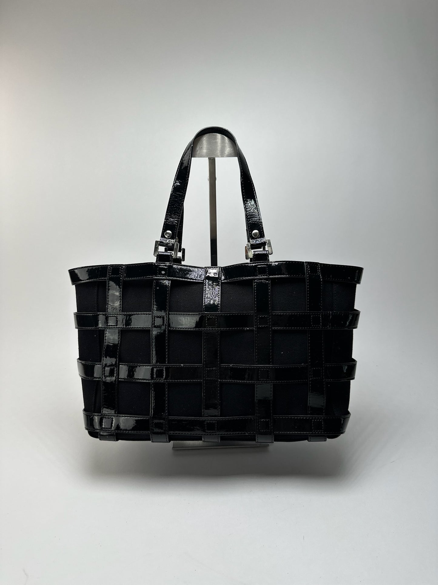 Sac cage vintage en cuir verni Courreges noir