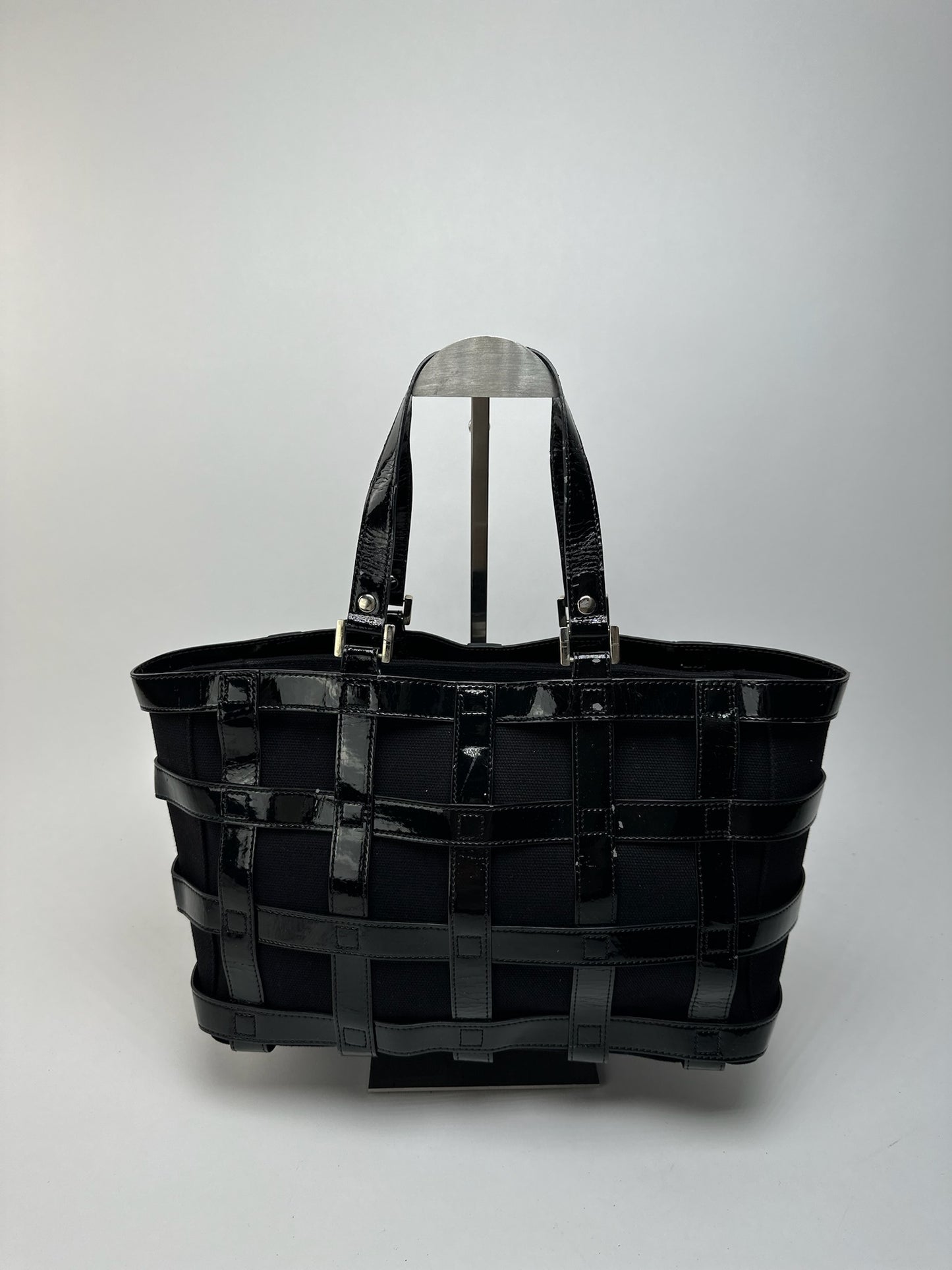Sac cage vintage en cuir verni Courreges noir