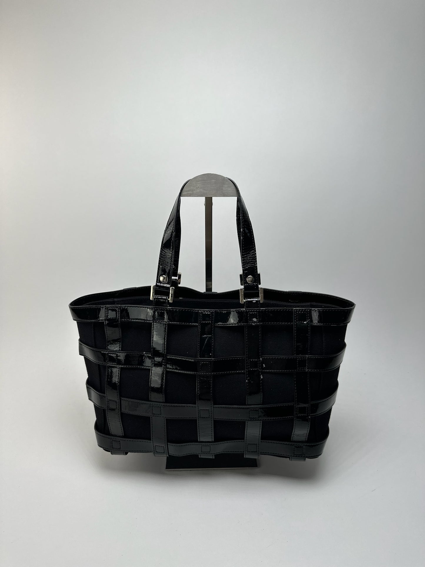 Sac cage vintage en cuir verni Courreges noir