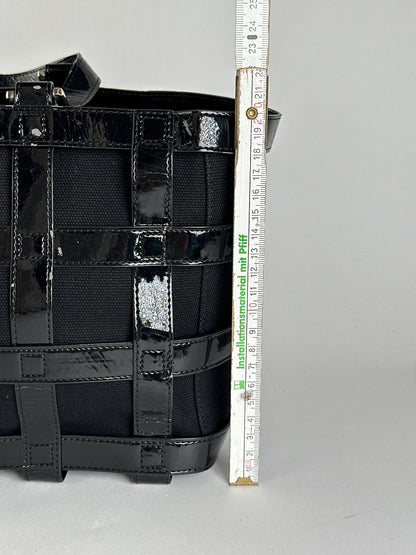 Sac cage vintage en cuir verni Courreges noir