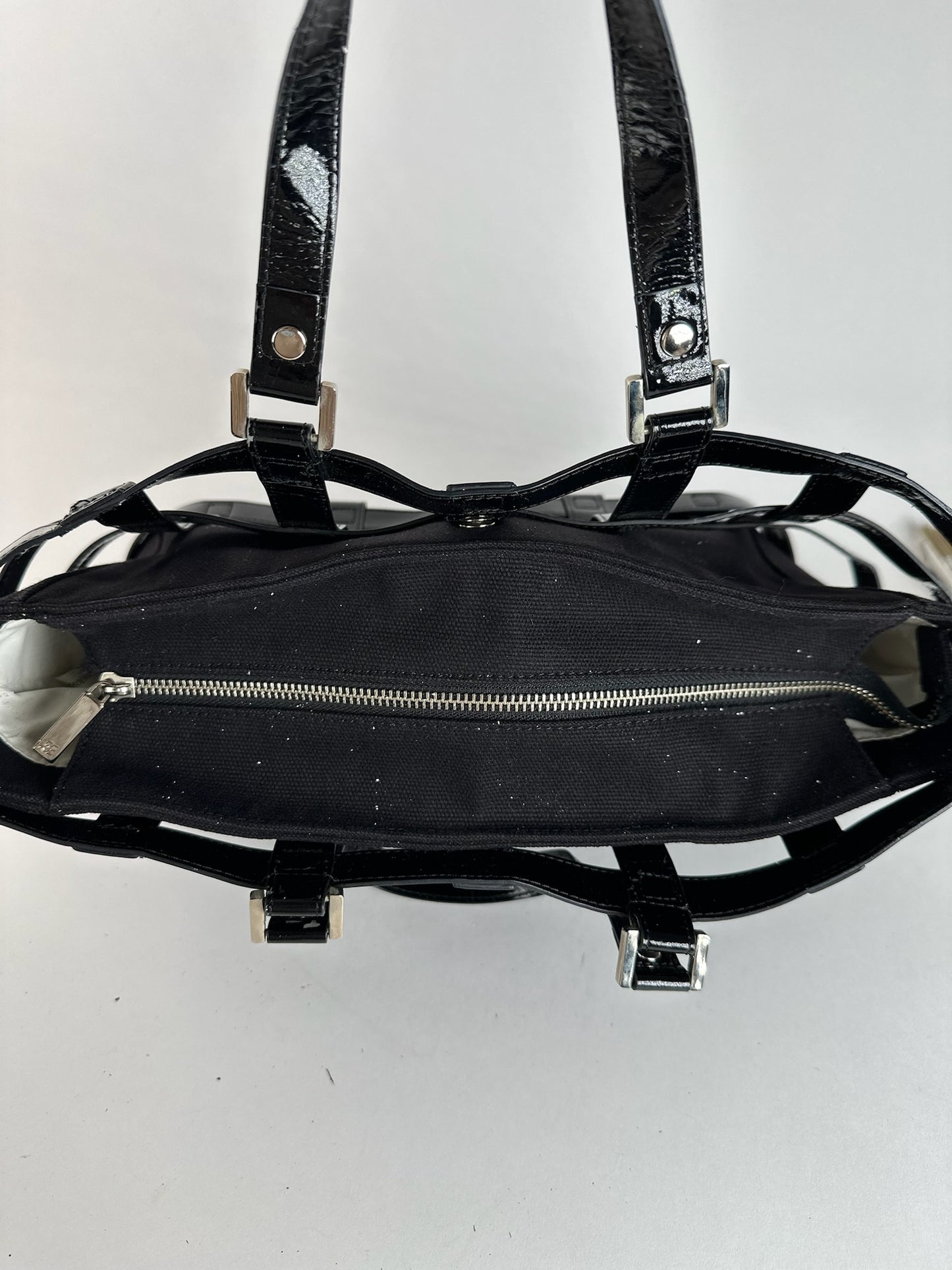 Sac cage vintage en cuir verni Courreges noir