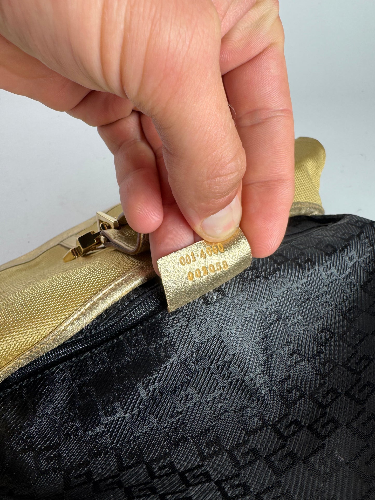 Sac Jackie vintage en cuir et toile Gucci doré