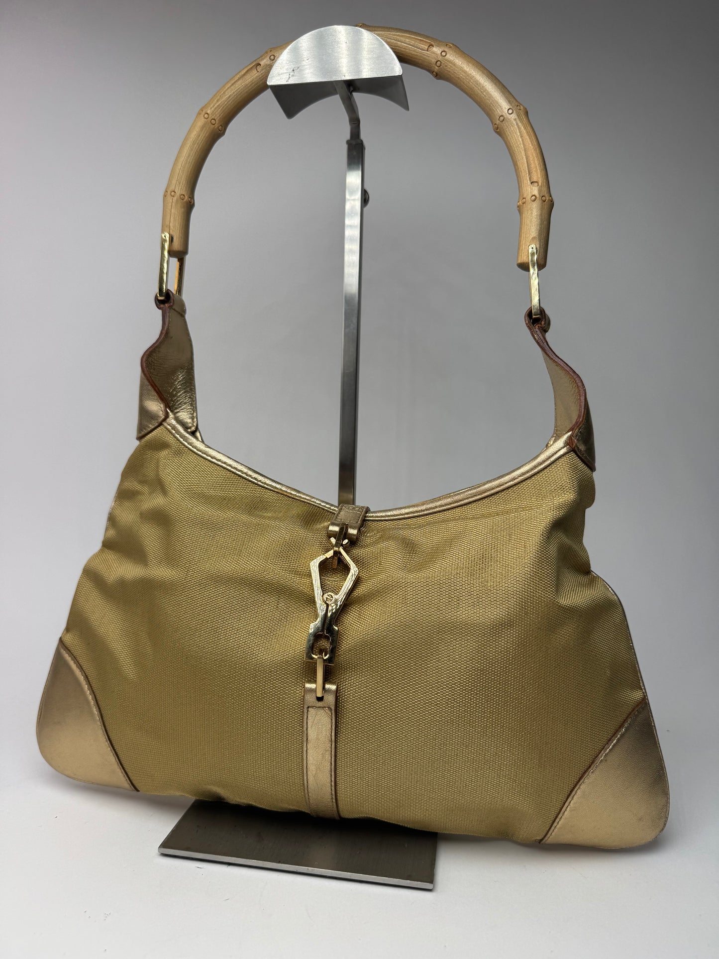 Sac Jackie vintage en cuir et toile Gucci doré