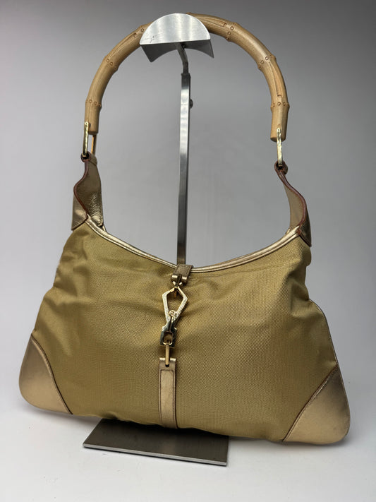 Sac Jackie vintage en cuir et toile Gucci doré