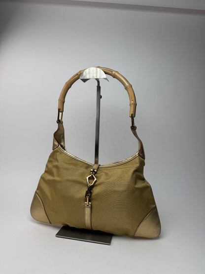 Sac Jackie vintage en cuir et toile Gucci doré
