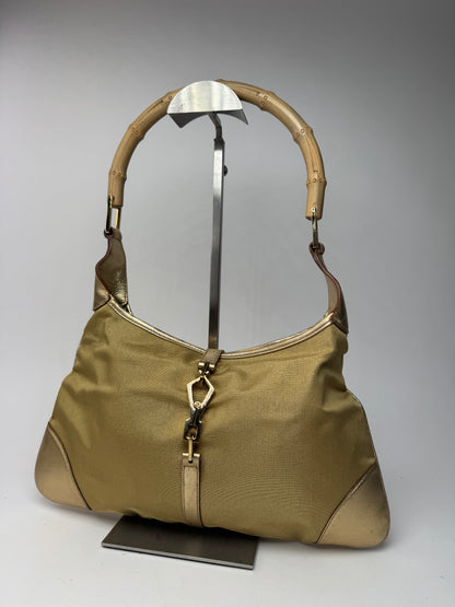 Sac Jackie vintage en cuir et toile Gucci doré